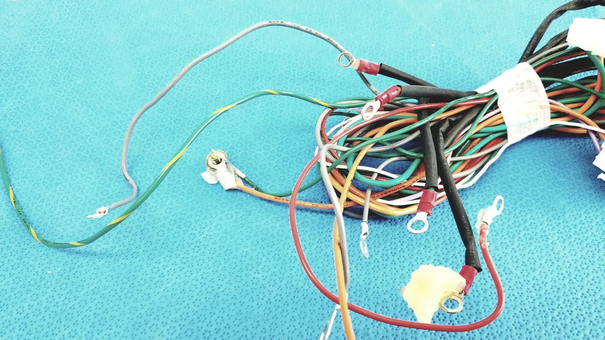 P10 103 multi-pin connectors wire harness cable with bundled multi-colored wires and exposed metal connectors with red insulation
