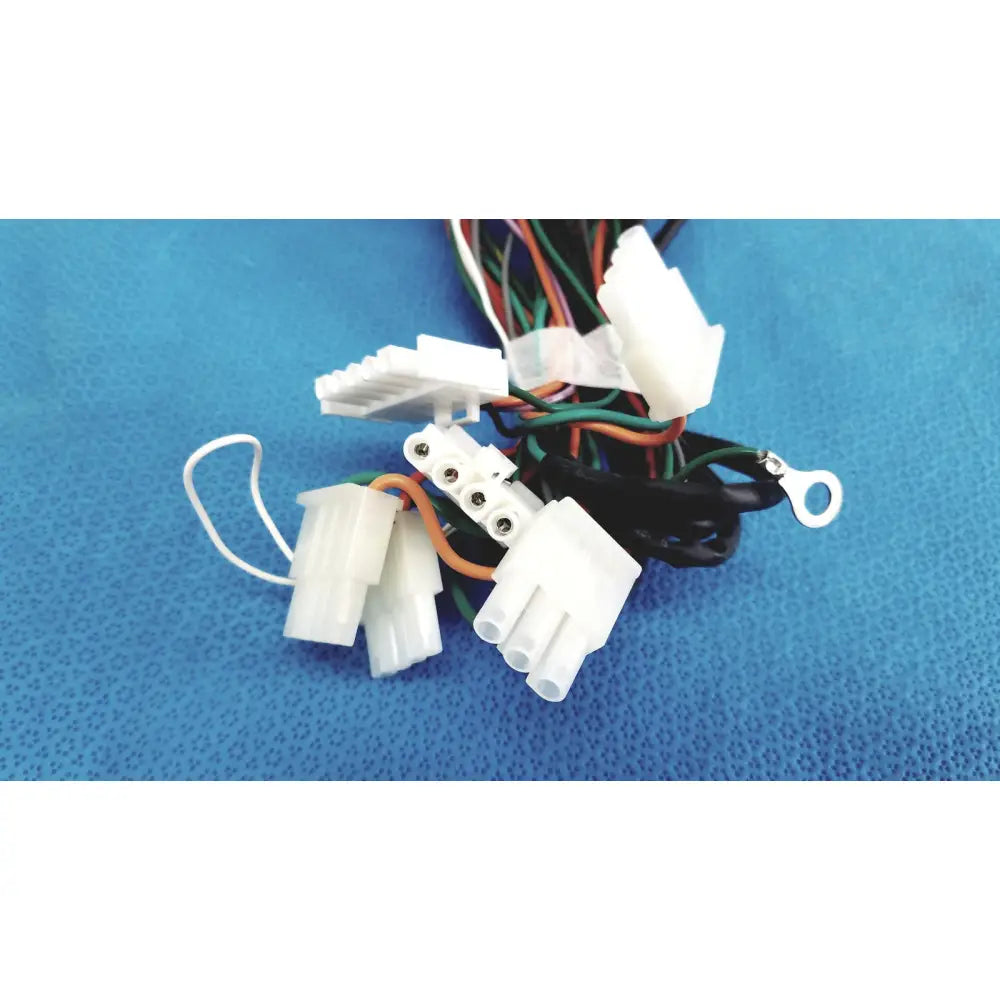 White plastic p10 103 multi-pin connectors wire harness cable with multiple colored wires bundled together