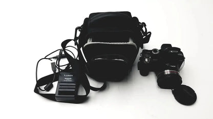 Panasonic Model DMC-FZ35 Digital Camera with Lumix DE-A43 Battery Charger Digital Camera, second-hand product photo 1
