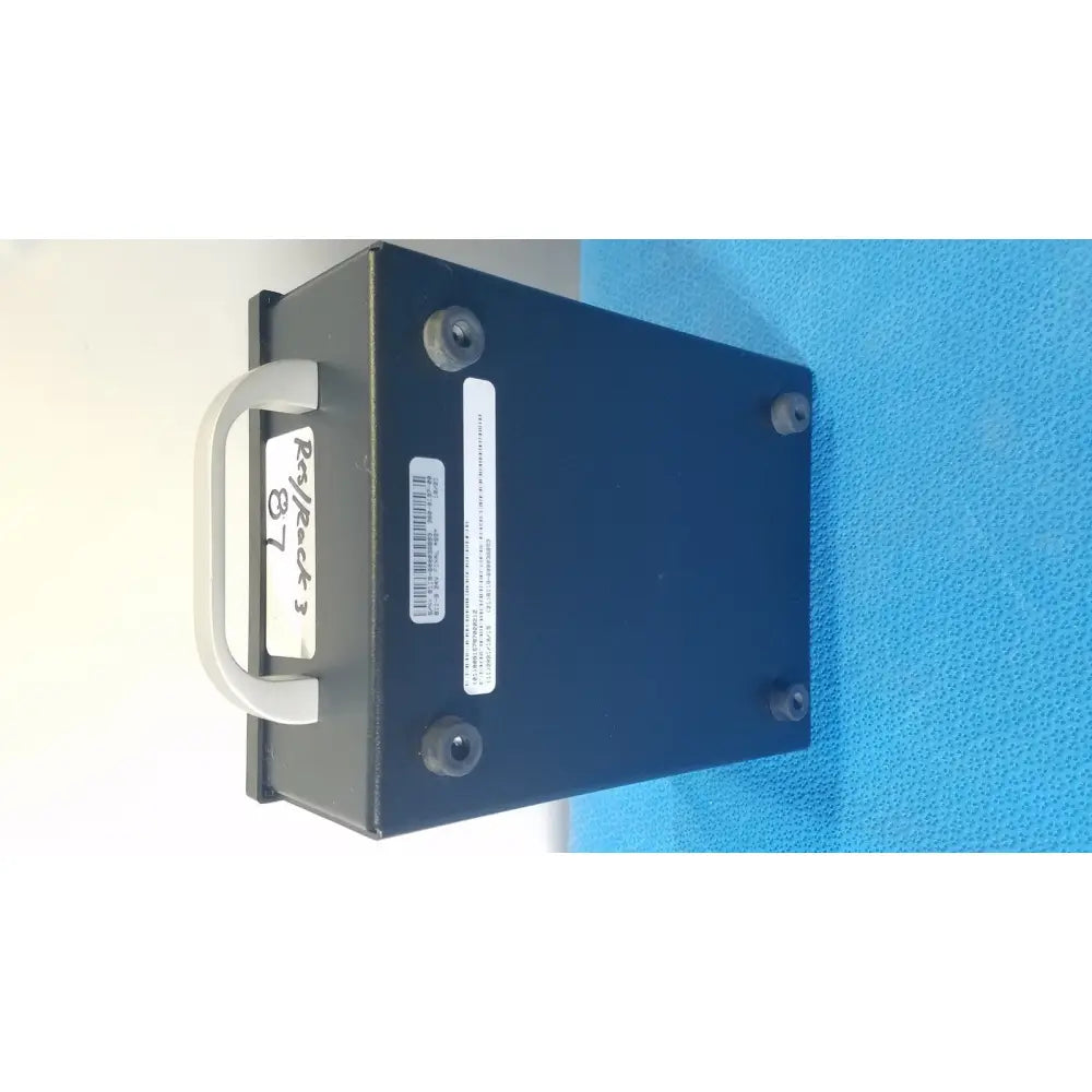 Dark blue rectangular parks medical electronics flow detector model 811-B with white handle and black rubber feet