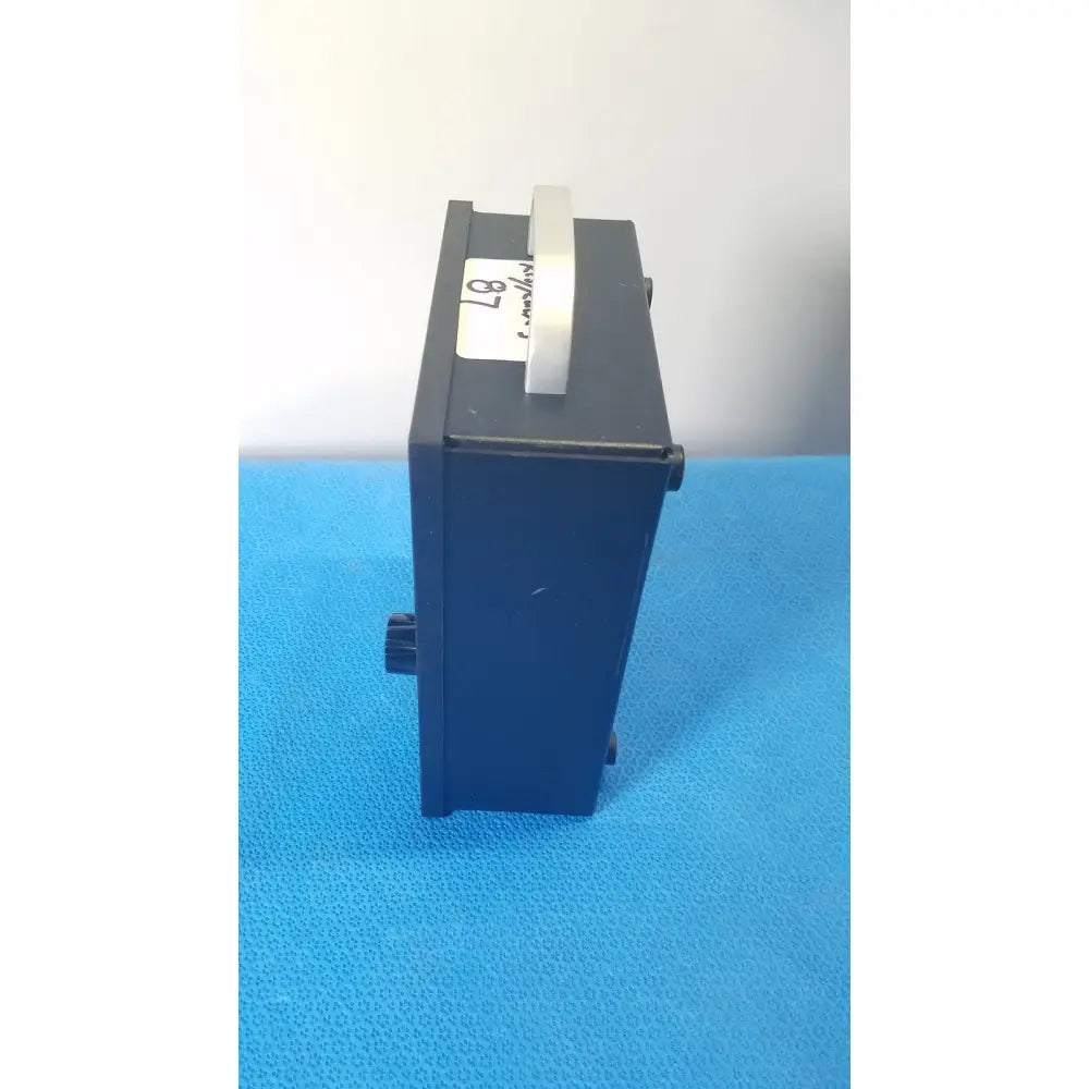 Black rectangular parks medical electronics flow detector model 811-b with silver handle and black side knobs