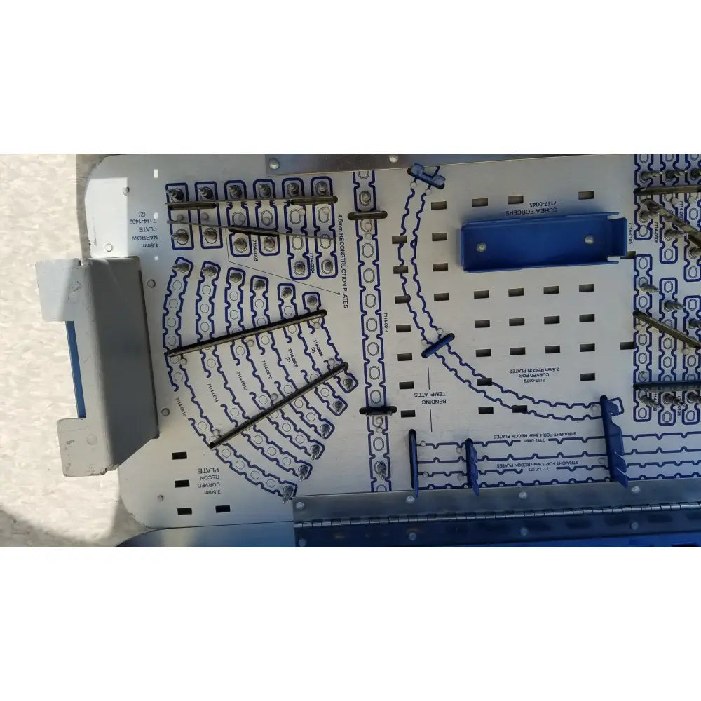 Blue and white electronic circuit board of pelvic fragment system implants 7117-4005 designed for reuse medical applications