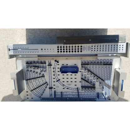 Silver metal pelvic fragment reuse medical server rack with blue plastic components and labeled ports visible from back side