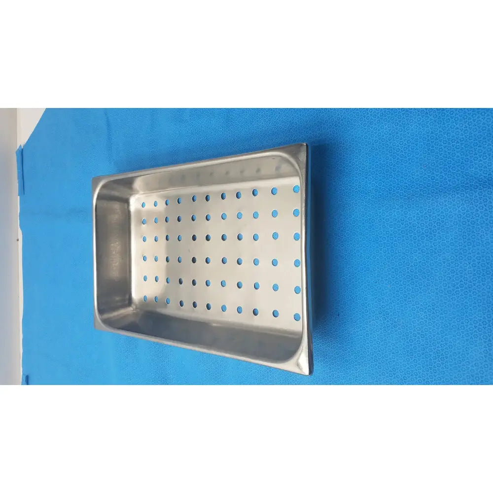 Perforated stainless steel rectangular steam table tray with circular holes for steam buffet use