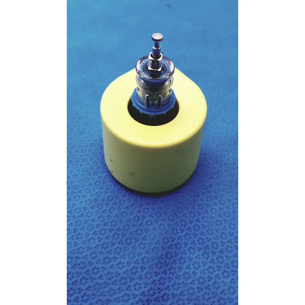 Yellow cylindrical base medical nio adult simulation kit with clear glass bulb and metallic top by persys medical nio