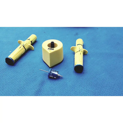 Yellow persys medical nio adult simulation syringe with black caps and side grips for medical nio adult training