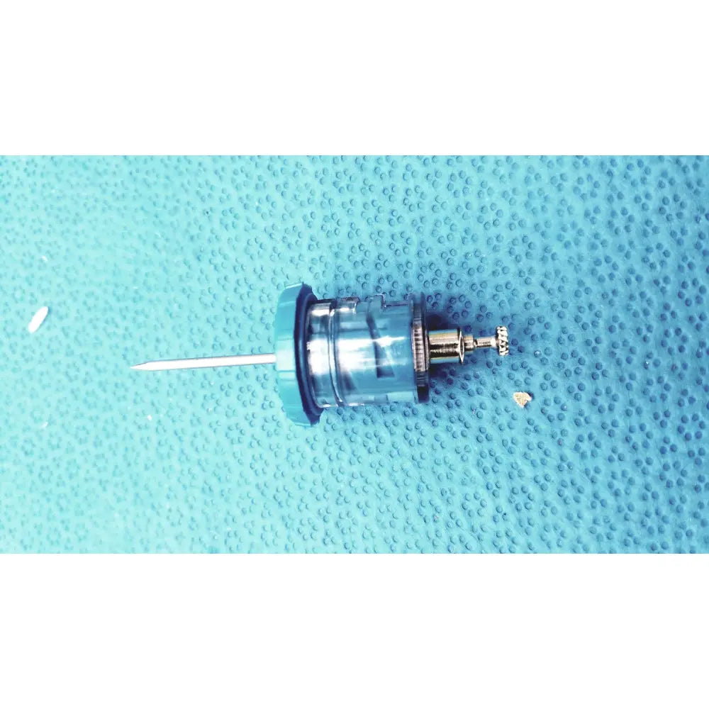 Blue plastic and metal faucet cartridge with silver needle-like protrusion for persys medical nio adult simulation kit