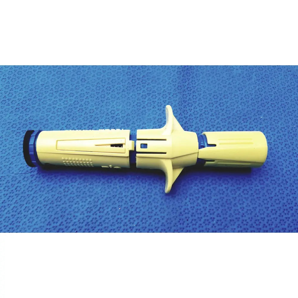 Yellow plastic surgical drill bit with blue accents and textured grip from persys medical nio adult simulation kit