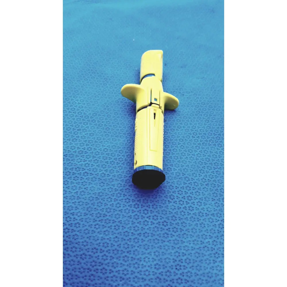 Yellow plastic insulin pen with black tip and ergonomic grip from persys medical nio adult simulation kit