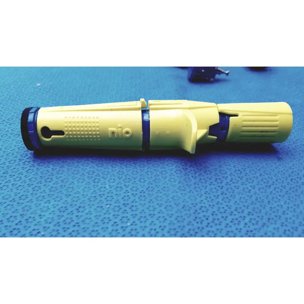 Yellow and blue plastic persys medical nio adult simulation device with textured grip sections for medical training