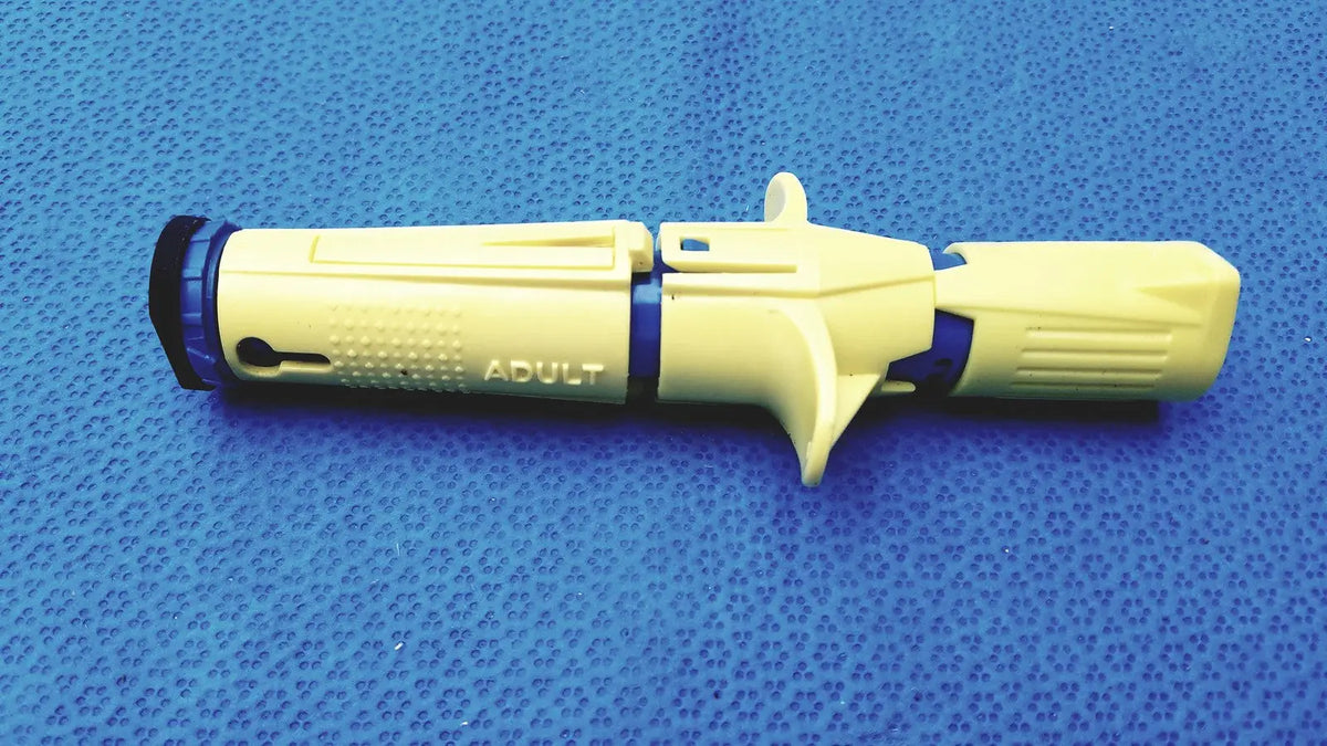 Persys medical nio adult simulation kit showing yellow and blue plastic medical nio adult device with adult engraving