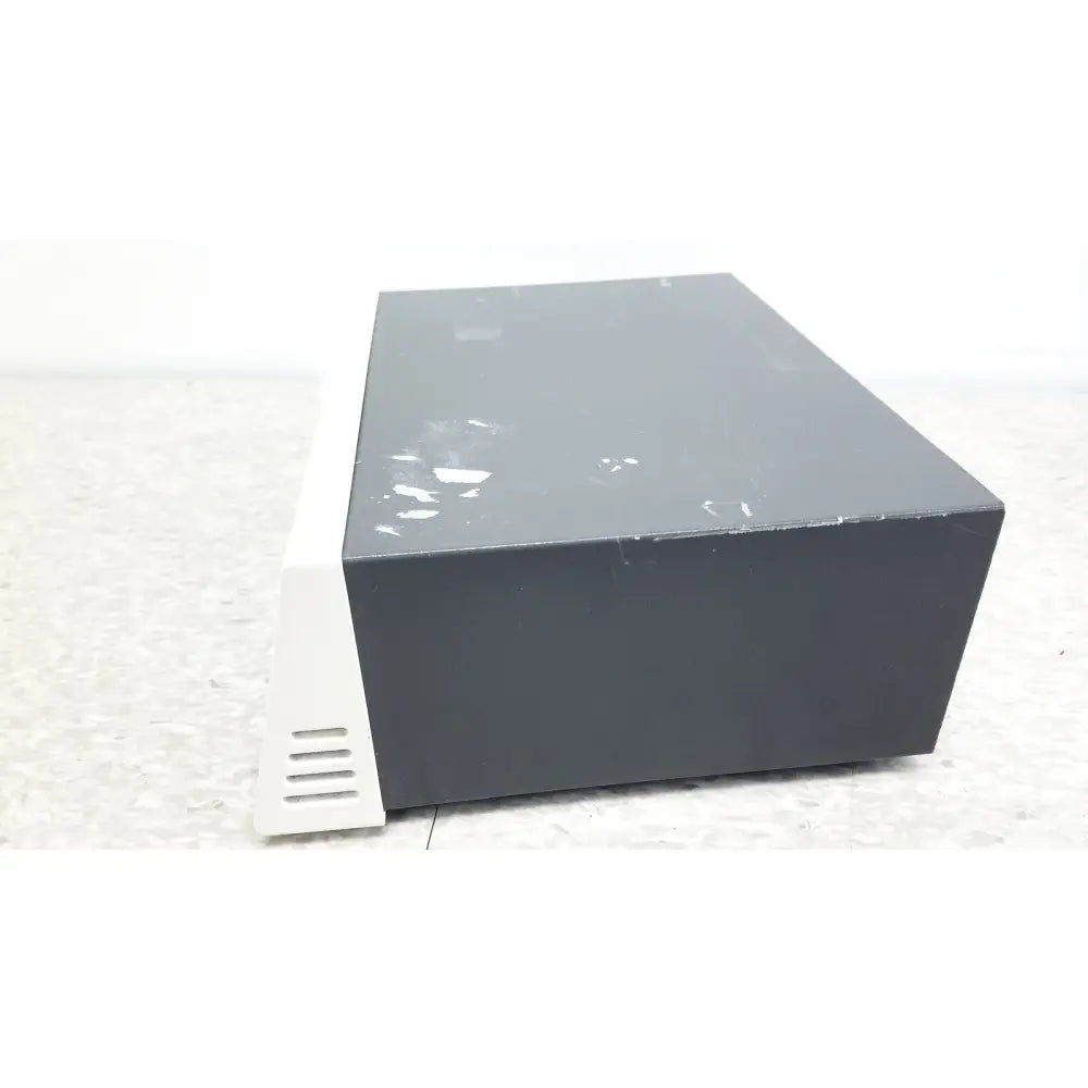 Black rectangular pharmacia biotech electrophoresiis power supply eps 300 with matte finish and white ventilation slats on side