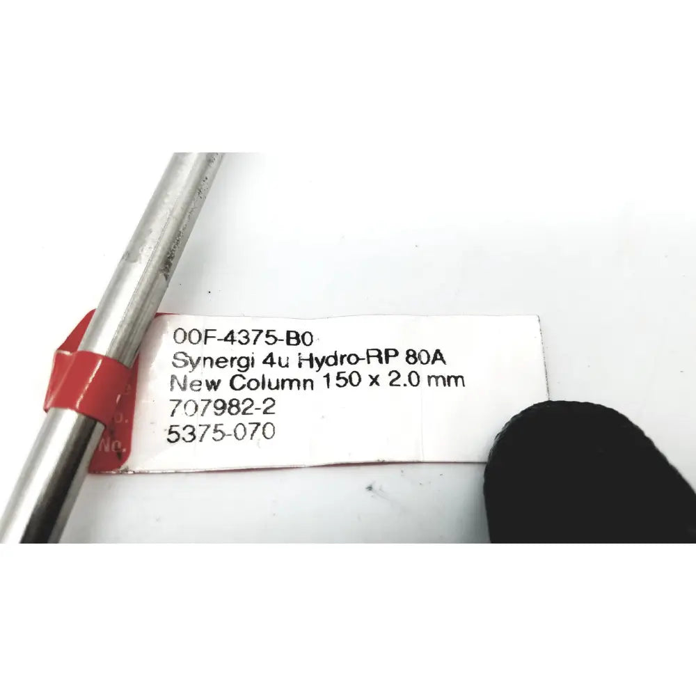 Silver metallic cylindrical chromatography column with red label for phenomenex 00f-4375-bo synergi 4u hydro rp 80a