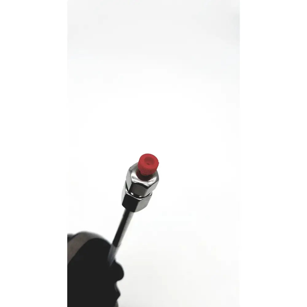 A sleek chrome-finished metal needle with a bright red cap for phenomenex 00g chromatography columns reuse medical tools