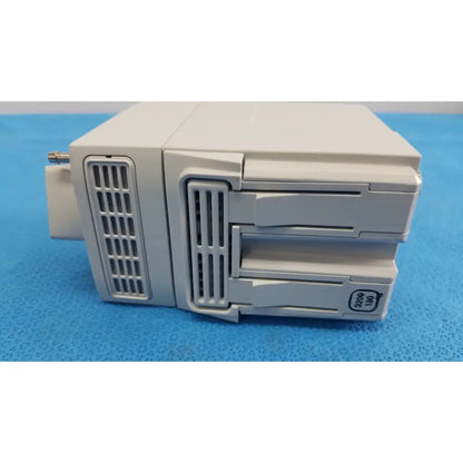 White plastic philips intellivue g7m module 3200/190 with vertical ventilation grilles and stacked drawers