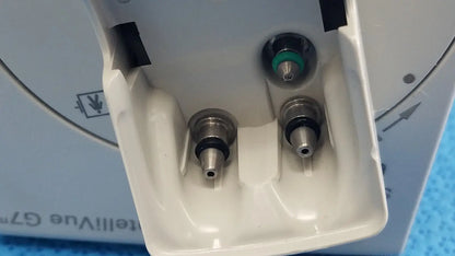 White plastic housing with three metallic nozzles including one green accent of philips intellivue g7m module