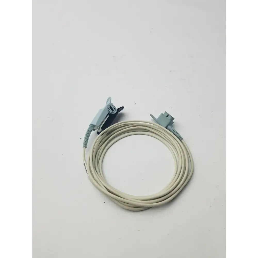 A coiled beige medical cable with gray connectors for philips adult finger probe spo2 sensor direct connect 9 pin model