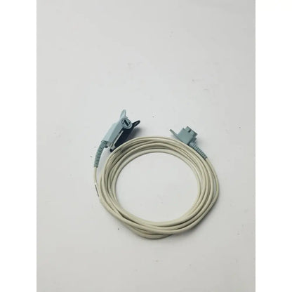 A coiled beige medical cable with gray connectors for philips adult finger probe spo2 sensor direct connect 9 pin model