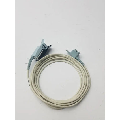 A coiled beige philips adult finger spo2 sensor cable with a gray clip-on connector and rectangular 9 pin plug