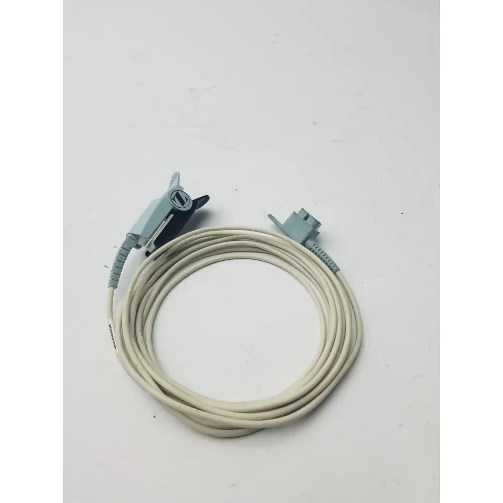 Beige philips adult finger probe spo2 sensor cable with light blue plastic connectors and clip attachment