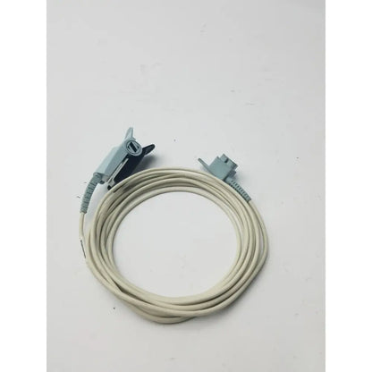 Beige philips adult finger probe spo2 sensor cable with light blue plastic connectors and clip attachment