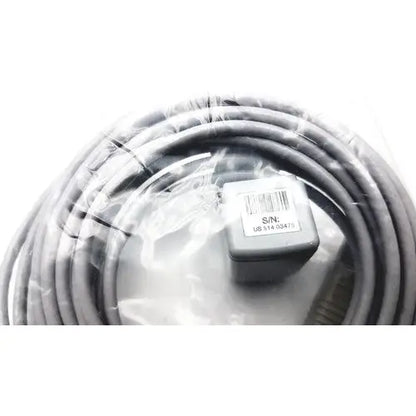 Gray coiled cable with a small gray rectangular connector labeled s/n ub s14 30475 for philips advanced etco2 sensor