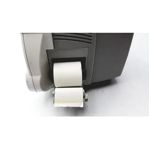 Gray philips intellivue m4605a mp30 patient monitor receipt printer with two white paper rolls emerging from front slot