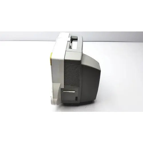 Gray and white vintage crt monitor with ribbed side panel of philips intellivue m4605a mp30 patient monitor