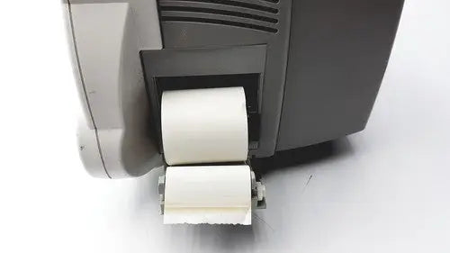 Gray philips intellivue m4605a mp30 patient monitor receipt printer with two white paper rolls emerging from front slot