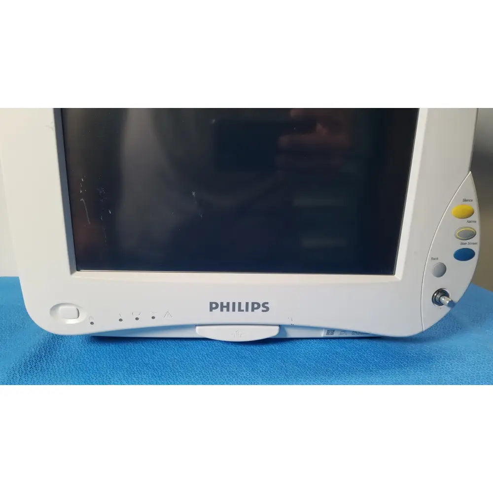 White Philips IntelliVue M8105A patient monitor with glossy screen and control buttons on right side for medical use
