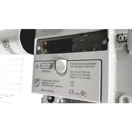 Silver metallic label with black compliance certifications on the back of philips intellivue mp30 de52614137 device with stand