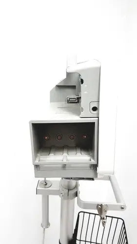 Silver metallic philips intellivue mp30 m4605a medical imaging machine with rectangular housing and four circular ports open front