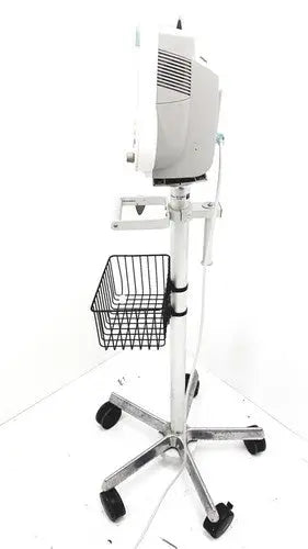 White medical examination lamp mounted on chrome stand with black caster wheels and wire basket for philips intellivue mp30 m4605a