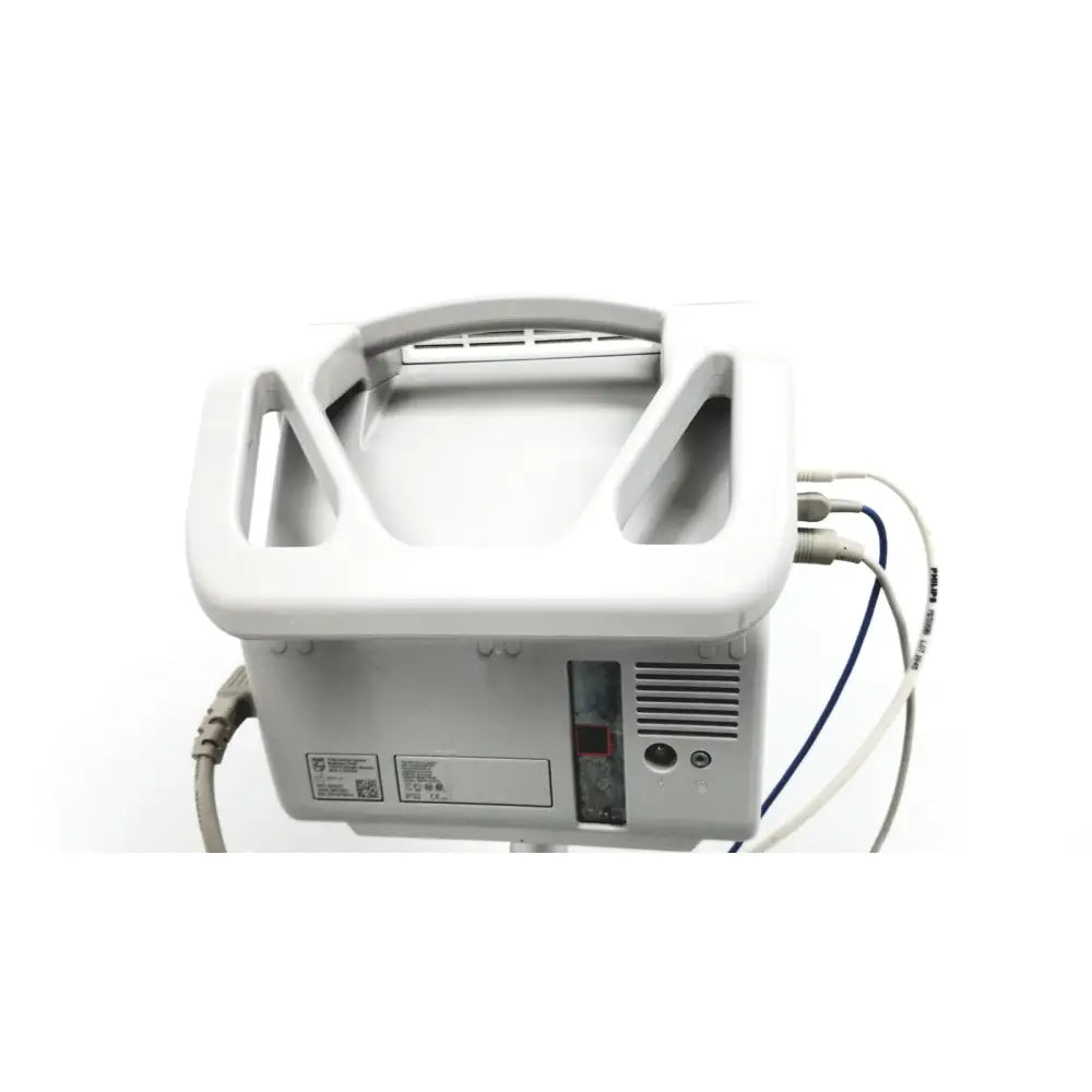 White plastic philips intellivue mp5 patient monitor with integrated handle and multiple connected cables on rolling stand