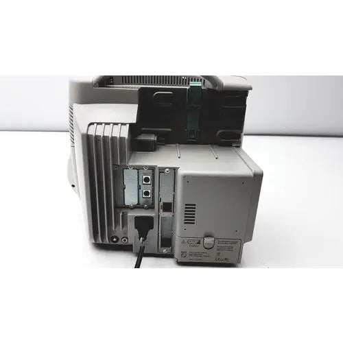 Gray plastic philips intellivue mp50 patient monitor showing internal circuit board and side ventilation slats