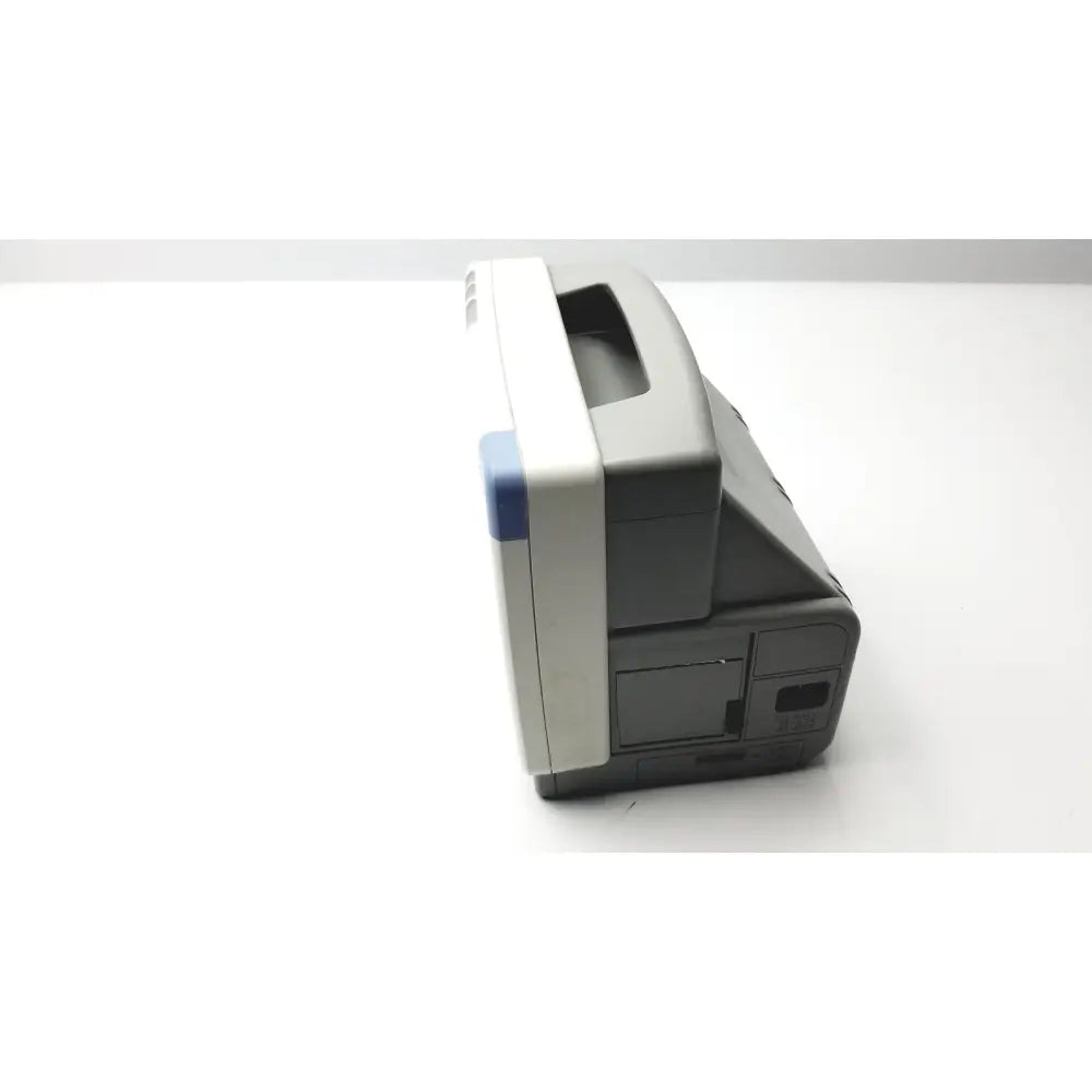 Gray and white plastic handheld philips intellivue mp5sc touch screen patient monitor with blue accent working model
