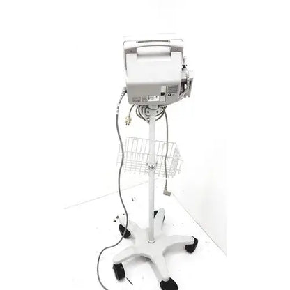 White philips intellivue mp5t healthcare monitor mounted on wheeled stand with wire basket for medical use