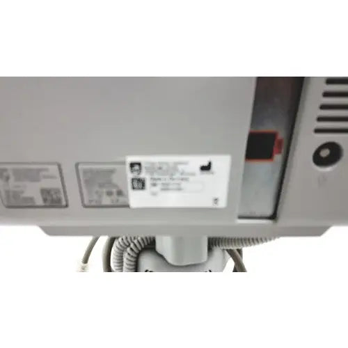 Gray plastic philips intellivue mp5t healthcare monitor showing the back with a white label affixed