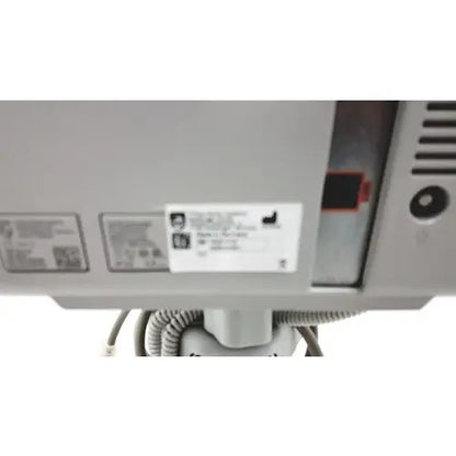Gray plastic philips intellivue mp5t healthcare monitor showing the back with a white label affixed