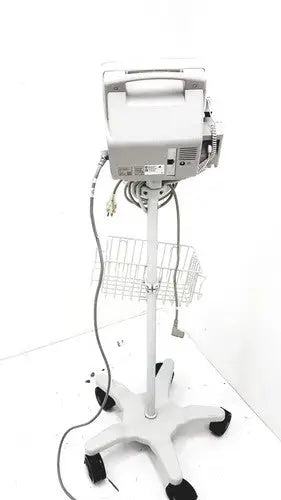 White philips intellivue mp5t healthcare monitor mounted on wheeled stand with wire basket for medical use