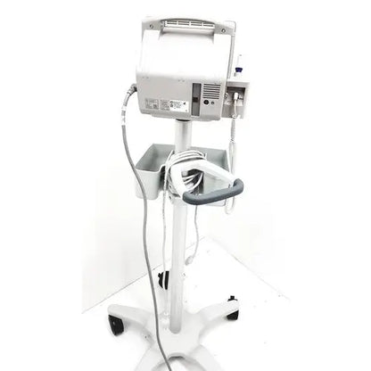 White philips intellivue mp5t patient monitor mounted on wheeled cart with gray handle and cable trays for healthcare use