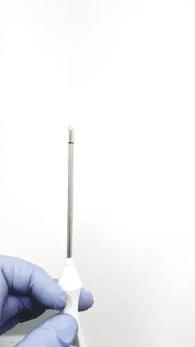 White-handled medical instrument with a slender metallic shaft for philips intellivue mp5t patient monitor use