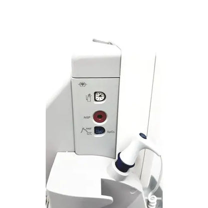 White philips intellivue mp5t patient monitor showing circular ports labeled nibp spo2 and fast bip on back side