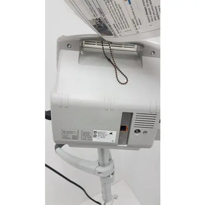 White plastic philips intellivue mp5t patient monitor with ventilation slits and control buttons on rolling stand
