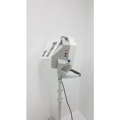 White philips intellivue mp5t patient monitor with digital display and control panel on adjustable rolling stand