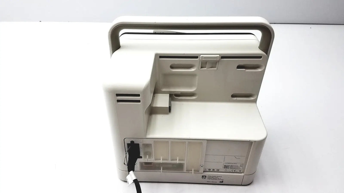 Beige plastic portable philips intellivue mx400 patient monitor ventilator with integrated handle and power cord