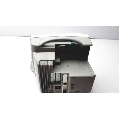 Gray plastic philips intellivue patient monitor with handle and visible internal components for medical use