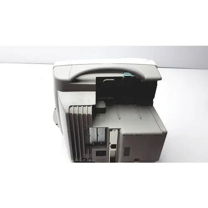 Gray plastic philips intellivue patient monitor with handle and visible internal components for medical use