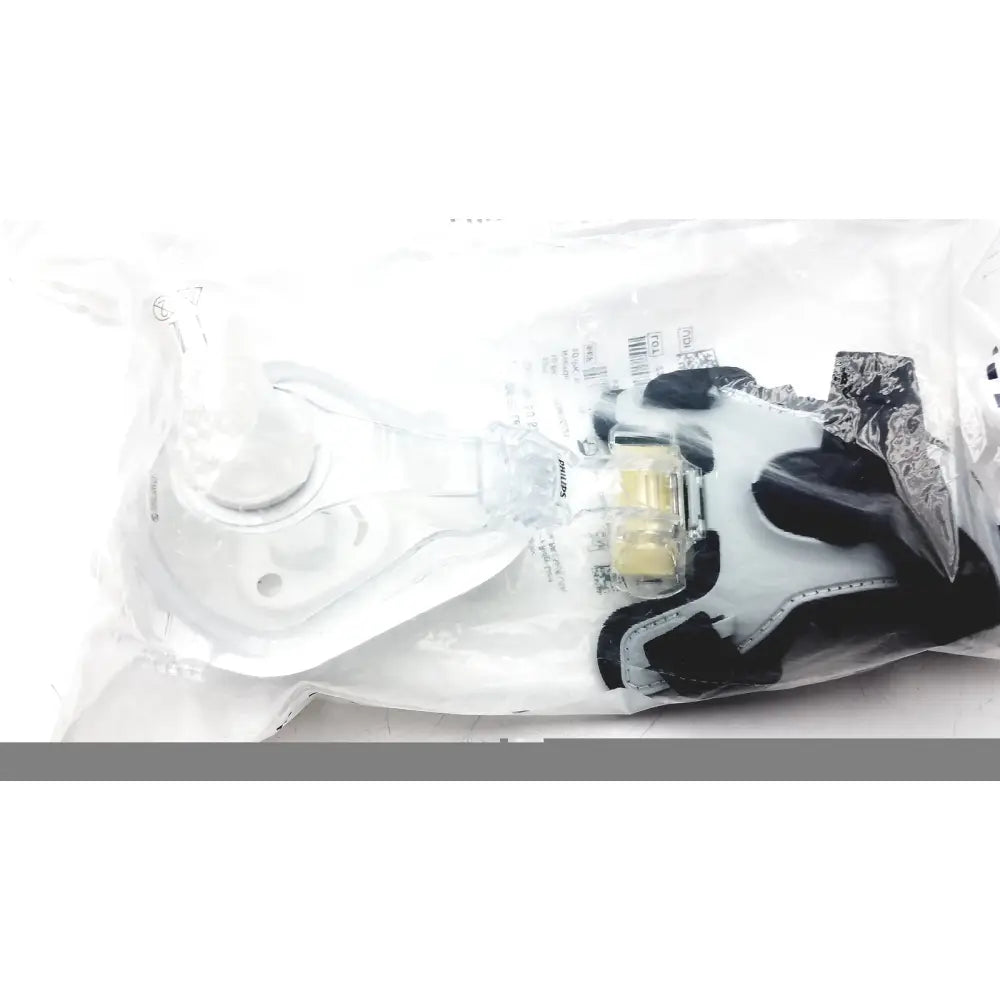 Clear plastic face mask philips l af531 with black elastic straps and yellowish filter for reuse medical use
