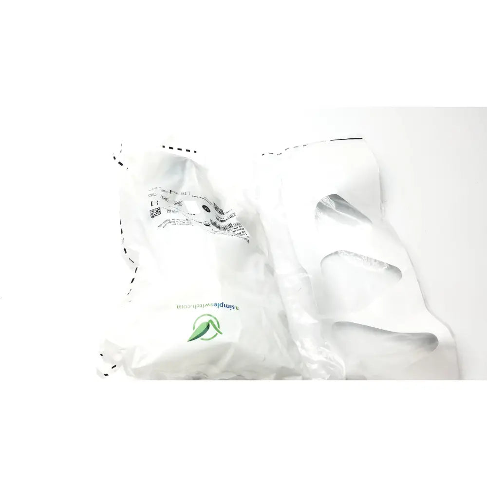 White plastic bag with green logo and black text containing philips m af531 ee leak capstrap for reuse medical use